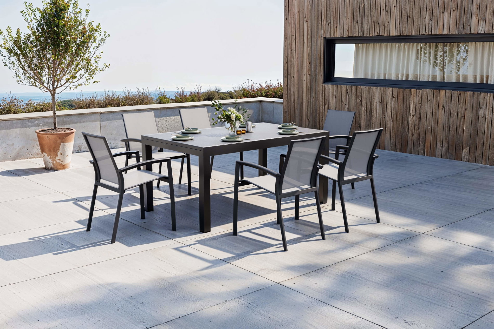 Conjunto de comedor de jardín OUTFLEXX Premium, antracita mate/antracita, aluminio/Spraystone/Ranotex, mesa 160/260 x 100 cm, 6 sillas apilables
